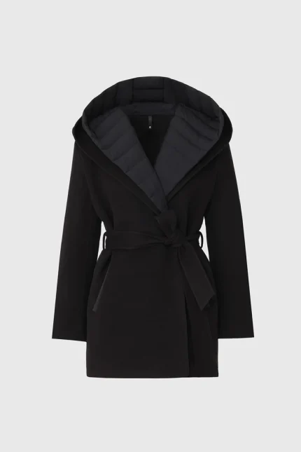 Discover the BETHANY Reversible Black Wool Coat, a sophisticated women's winter outerwear piece designed for effortless elegance and versatile cold-weather styling. Combining a luxurious wool construction with quilted down insulation, this premium black coat offers warmth, comfort and timeless style. The BETHANY features a flattering wrap-inspired silhouette with an adjustable sash belt, allowing you to create a refined and elegant look. Its reversible design offers two styling options, making it a practical and versatile addition to your winter wardrobe. A double hood provides extra coverage, while waist welt pockets add everyday functionality without compromising the coat's clean, sophisticated appearance. The classic black color makes this women's wool winter coat easy to style with everything from tailored trousers and knitwear to dresses, denim and winter boots. Whether you're heading to work, enjoying a city day out or dressing for an evening occasion, the BETHANY adds a luxurious finishing touch to your cold-weather look. Key Features Reversible design for two versatile looks Premium wool construction Quilted down insulation Double hood for added warmth and coverage Adjustable sash belt Elegant wrap-inspired silhouette Waist welt pockets Classic black finish Signature Mackage detailing Designed for sophisticated winter styling